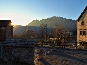 75 Dal bel borgo anitco di Arnosto nella luce e nei colori del tramonto verso il Resegone